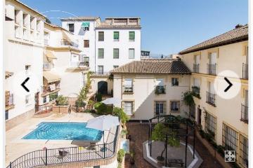 Piso con piscina y cochera junto Reyes Católicos 